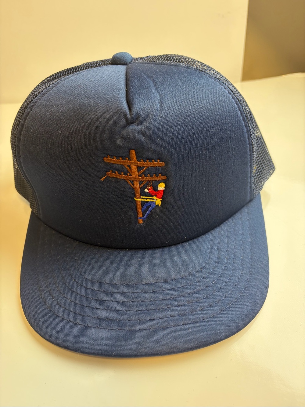 Navy Trucker Hat with Utility Pole Embroidery